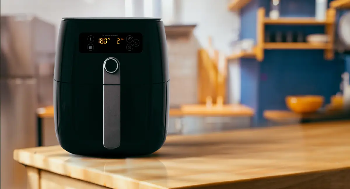 Gourmia-style air fryer on a kitchen counter representing common user complaints and performance issues